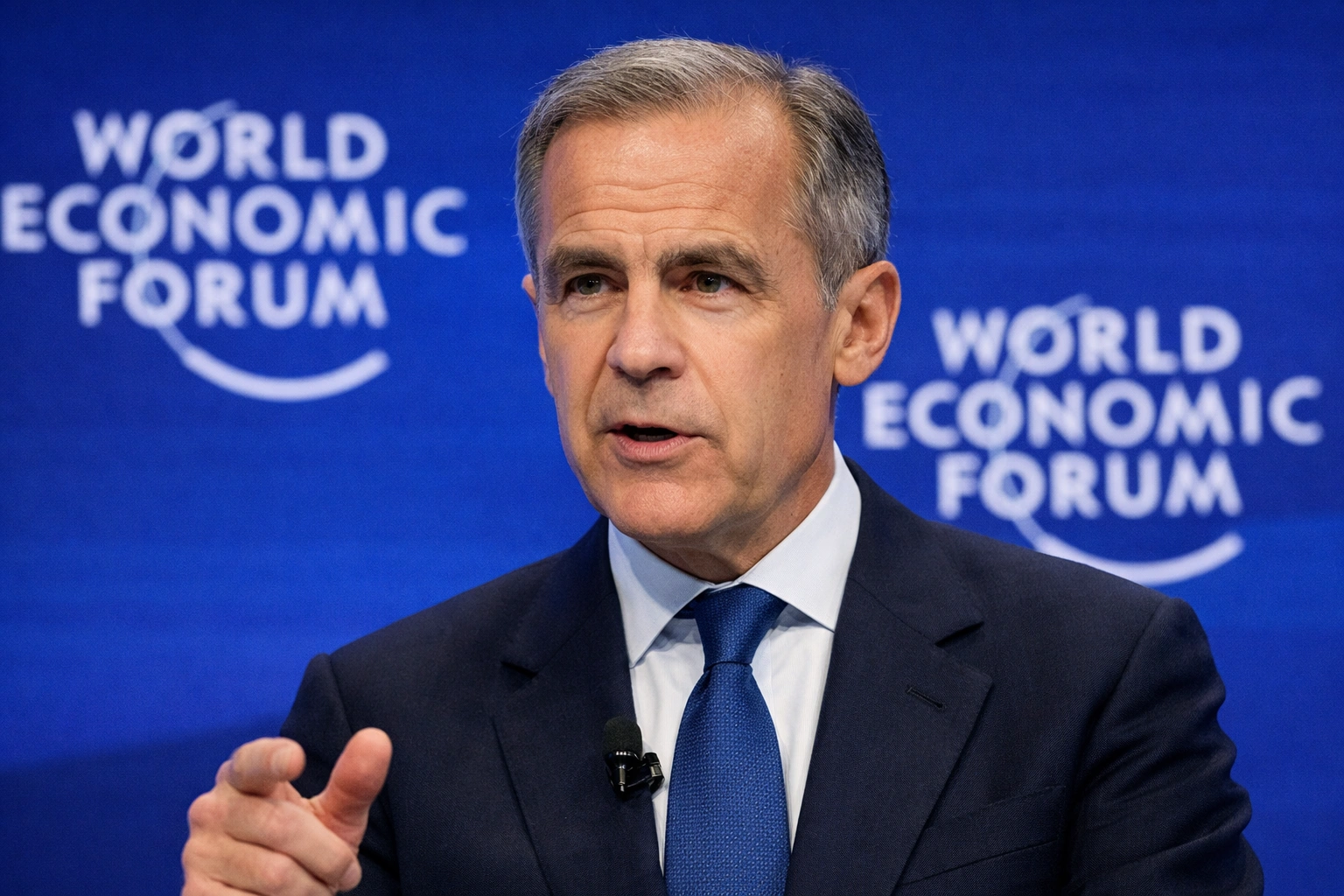 Mark Carney speaking at the World Economic Forum in Davos, addressing global leaders on the changing world order and economic fragmentation.